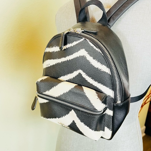 Coach Zebra MN CHRLE 39033 SV/BLACK
Coach Mini Charlie Women's Zebra Print EC - Picture 9 of 16